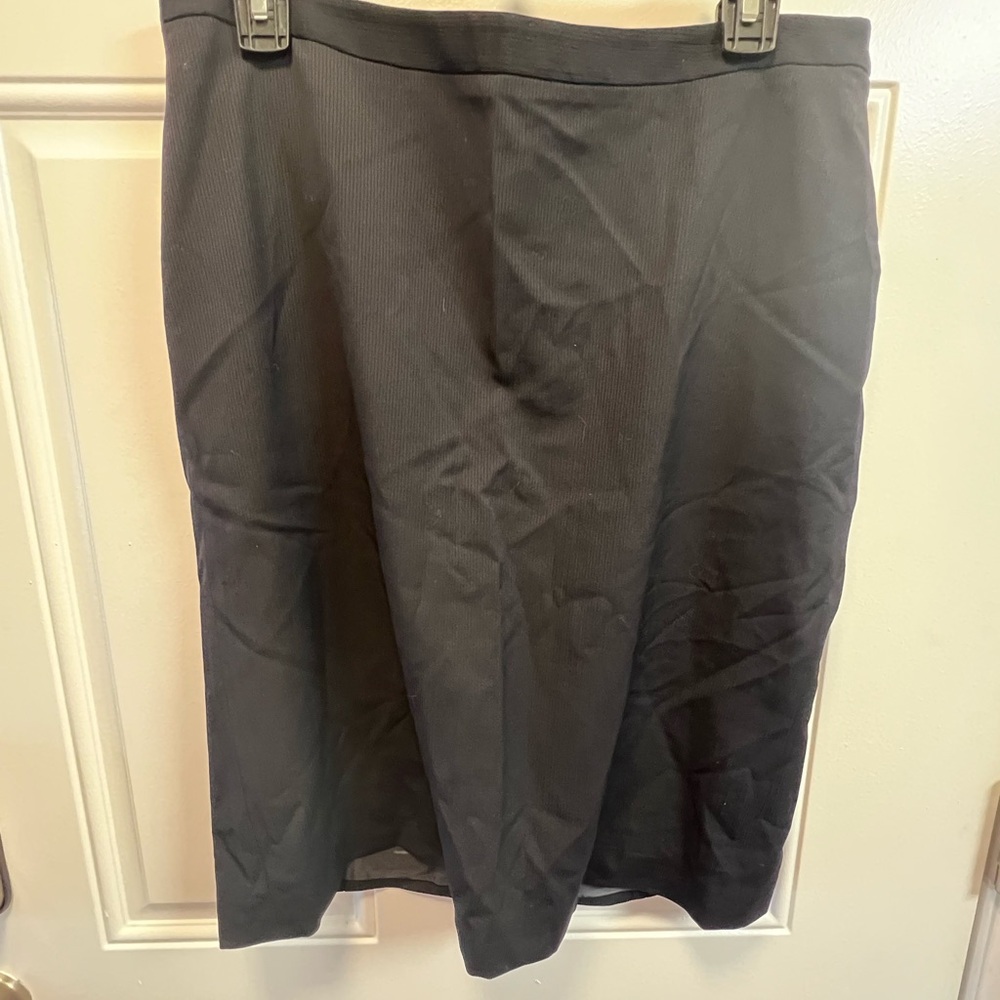 As is NWT Giorgio Armani skirt - small hole in back as pictured